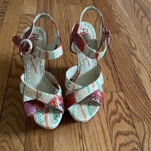 Mutual colored Alice & Olivia leather platform sandals.